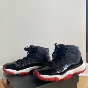 Air Jordan retro bred’s 11 mint condition..
